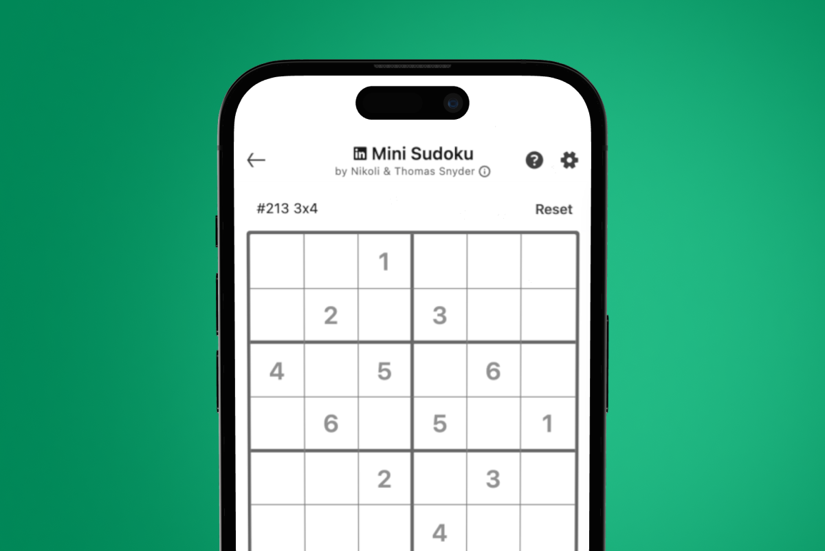 A smartphone with LinkedIn Mini Sudoku on the interface facing the camera on a green backdrop